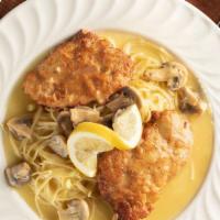 Chicken Piccata · Breast of chicken lightly breaded, sautéed with garlic, fresh mushrooms, lemon, parsley, and...