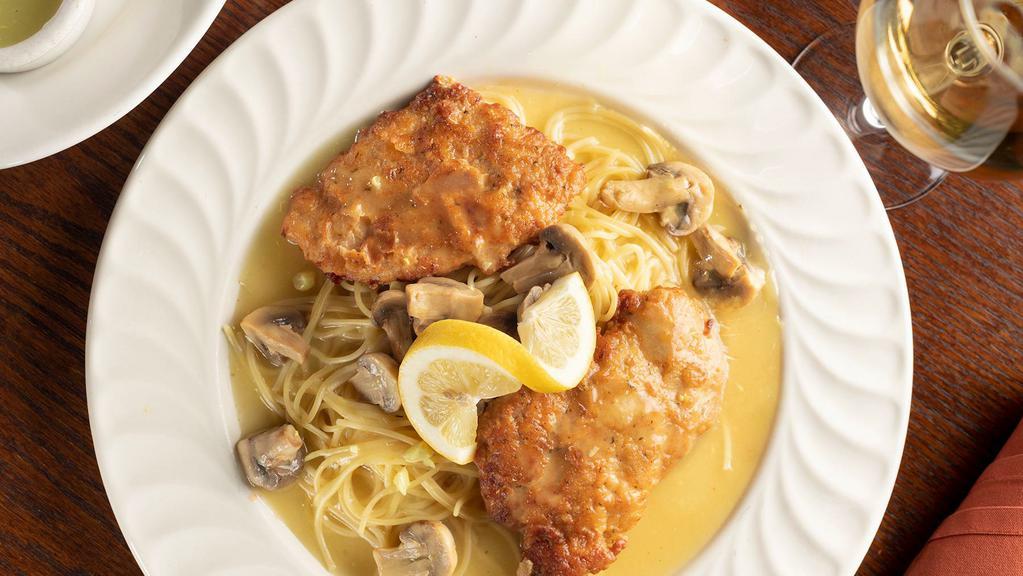 Chicken Piccata · Breast of chicken lightly breaded, sautéed with garlic, fresh mushrooms, lemon, parsley, and a white wine sauce.