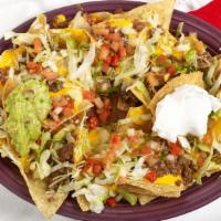 Nacho Platter With Beef · Fresh chips, pico de gallo, and melted cheese. Served with fried beans, guacamole, and sour ...