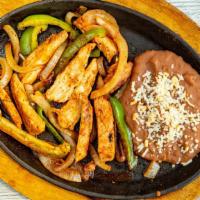 L-3. Chicken Fajitas · Broiled and marinated strips of chicken breast, sautéed with Spanish onions, tomatoes and be...