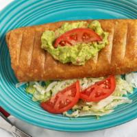 Burrito Frito · Regular meat and bean burrito deep-fried, covered with fresh guacamole, and tomatoes. Choice...