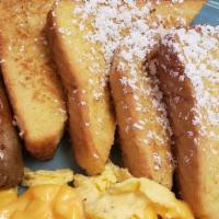 Double Barrel French Toast · Created from scratch with a rich batter of eggs, fine imported vanilla and buttermilk, serve...