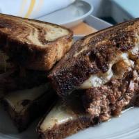 Patty Melt · 1\2 lb of our Special grind Angus Chuck smashed on the grill with melted Swiss cheese and gr...