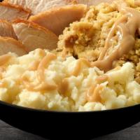 Hand Carved Turkey · Delicious white meat turkey, stuffing, mashed potatoes and gravy.