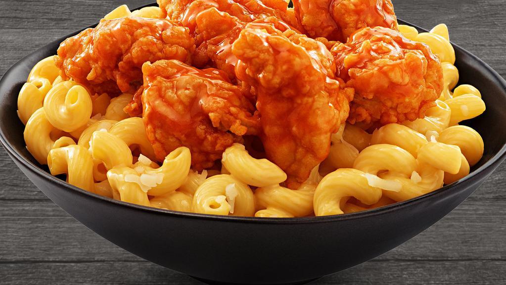 Buffalo Mac & Cheese · White meat chunks coated in Buffalo sauce and served over mac & cheese!