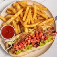 California Dog · 1/4 pound plus all beef jumbo hot dog, split down the middle and pan fried, topped with lett...