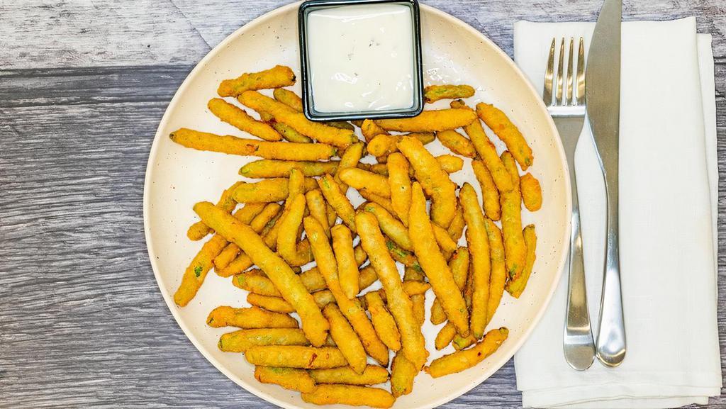Green Bean Fries · Breaded and Fried Green Beans. Your Choice of Sauce to Dip!