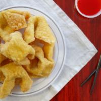 Crab Rangoon · Cream cheese fillings stuffed in wonton skin, then fried till golden crisps.  A savory and c...