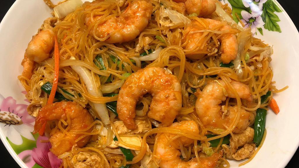 Shrimp Noodle · Shrimps and scrambled  egg stir fried with fresh mix vegetables, onions and thin rice noodle 
(vermicelli).