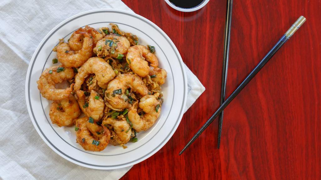 Jumbo Shrimp (15) · 15 jumbo shrimps sautéed with egg and green onion. *delicious*.