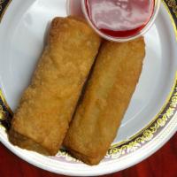 Egg Rolls (2) · 2 savory rolls stuffed with shredded vegetables and chicken wrapped in thick shell then frie...