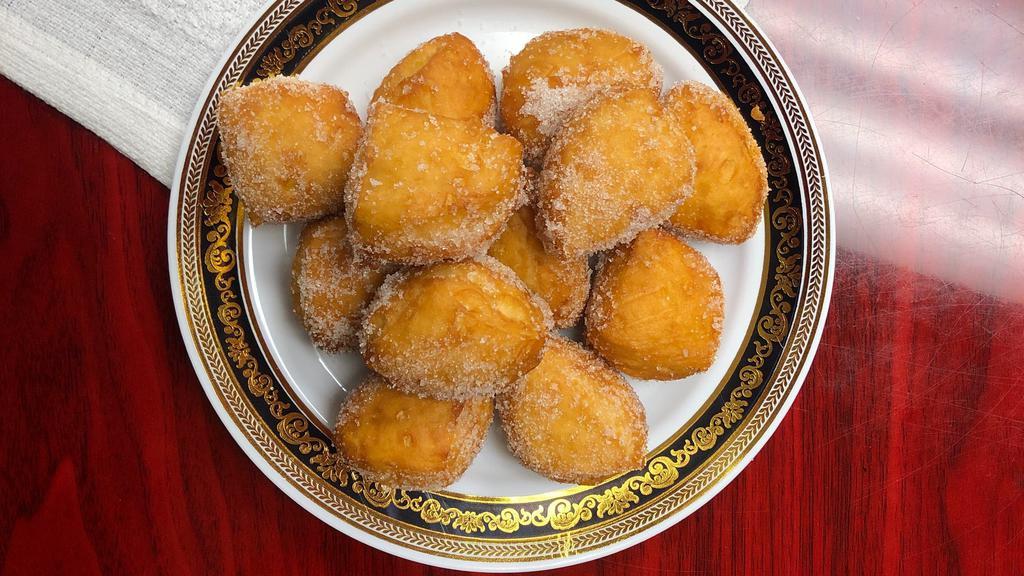 Sugar Donuts · 12 butter milk dough deep fried then tossed in sugar.