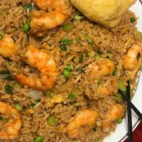 Shrimp Fried Rice · Shrimps stir fried with scrambled egg , onions and peas then seasoned to perfection with fri...