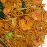 Shrimp Lo-Mein · Shrimps seasoned with fresh vegetables and onions then cook with  lo-mein noodle till tender...