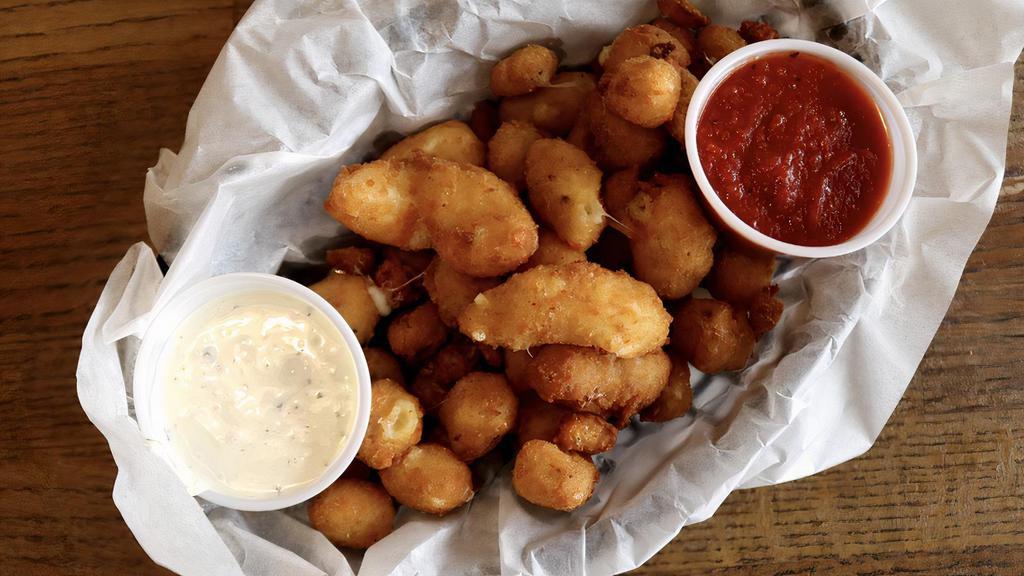 Fried Cheese Curds · Served with marinara and ranch dressing