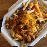 Dr Heiter'S Poutine Basket · Served with chili and shredded cheddar, cheese sauce and poutine gravy with cheese curds