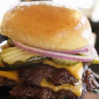 Cheeseburger · American cheese, pickle, red onion, ketchup, mayo