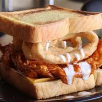 Backwoods · Sweet Heat BBQ-dipped chicken, Cheddar cheese, onion rings, ranch dressing, Texas toast bun