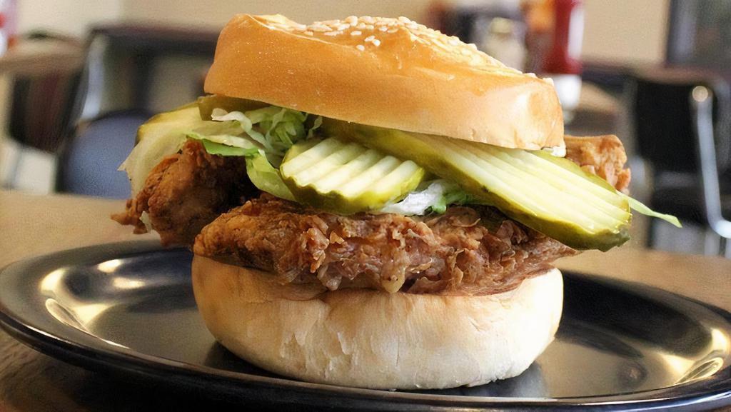 Poultrygeist · hand-breaded + fried chicken, pickle, lettuce, mayo