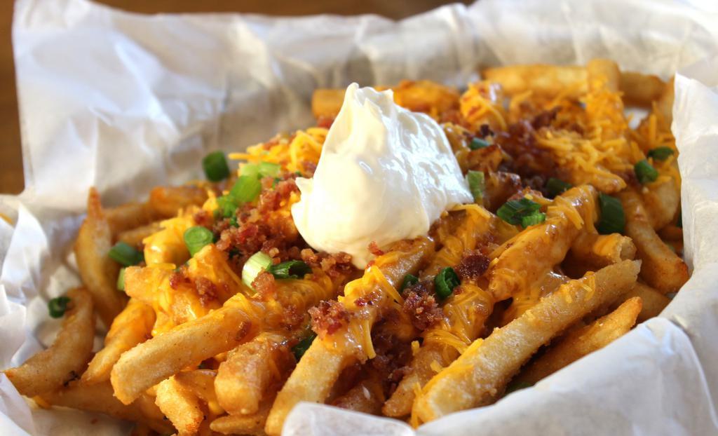 1/2 Loaded Fries · Sour cream, bacon, green onion, cheddar cheese, cheese sauce