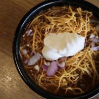 Bowl Chili · Topped with cheddar cheese, sour cream, onion