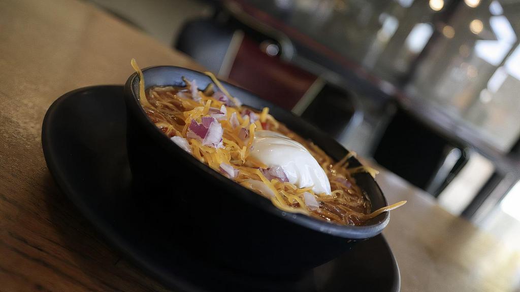 Cup Chili · Topped with cheddar cheese, sour cream, onion
