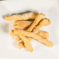 Garlic Twists · Homemade garlic twists served with homemade marinara sauce.