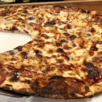 Four Cheese Pizza · Provolone, mozzarella, Parmesan, Pecorino Romano, red sauce.