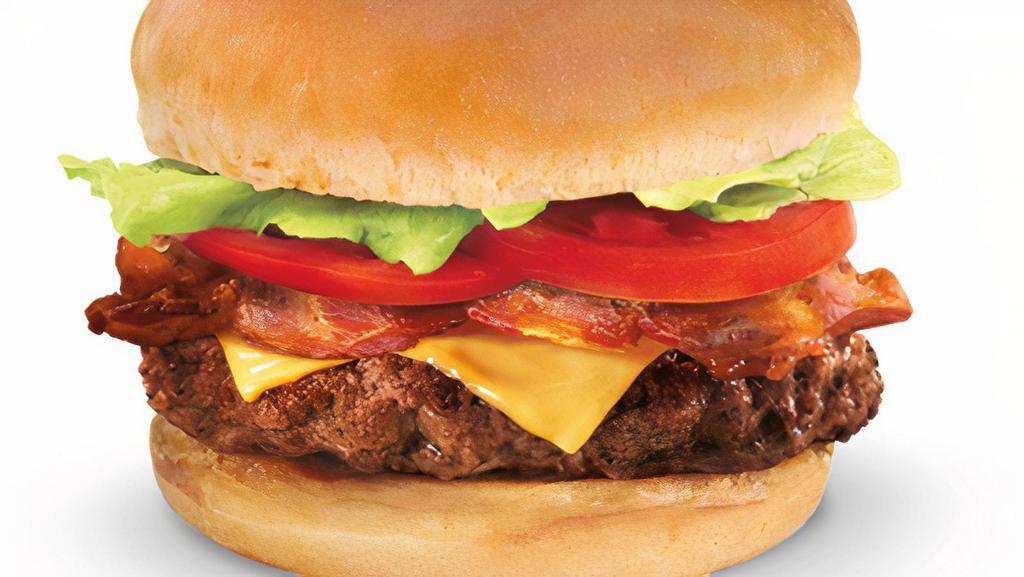 Bacon Cheeseburger Combo · 1/4 lb. of beef* with cheese, two slices of bacon, lettuce, tomatoes, pickles and mayonnaise.