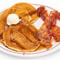 Pancakes With Bacon Or Sausage · Pancakes with Bacon or Sausage. Includes a choice of Mini Soft Drink or Small Milk.
