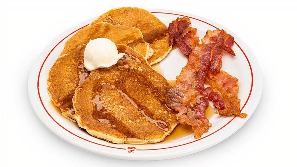 Pancakes With Bacon Or Sausage · Pancakes with Bacon or Sausage. Includes a choice of Mini Soft Drink or Small Milk.