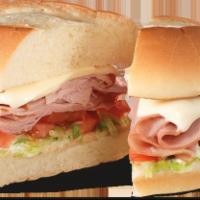 Buddie Boy® · Deli-sliced ham topped with melted Swiss cheese, tomatoes, lettuce and Frisch’s Original Tar...