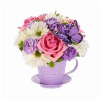 Fresh As Lavender Tea Cup Bouquet · Pink roses, florigene mini carnations and white daisy poms are joined by a flirty butterfly ...