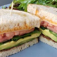 A.T. Sandwich · Bacon, avocado and tomato on lightly toasted pain levain bread with English spinach, gruyere...