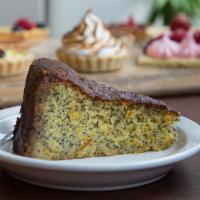 Flourless Spiced Orange Cake · Fresh oranges and poppy seeds make this a very moist and flavorful treat.