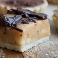 Chocolate Caramel Slice · Shortbread topped with Australian style caramel and chocolate ganache.