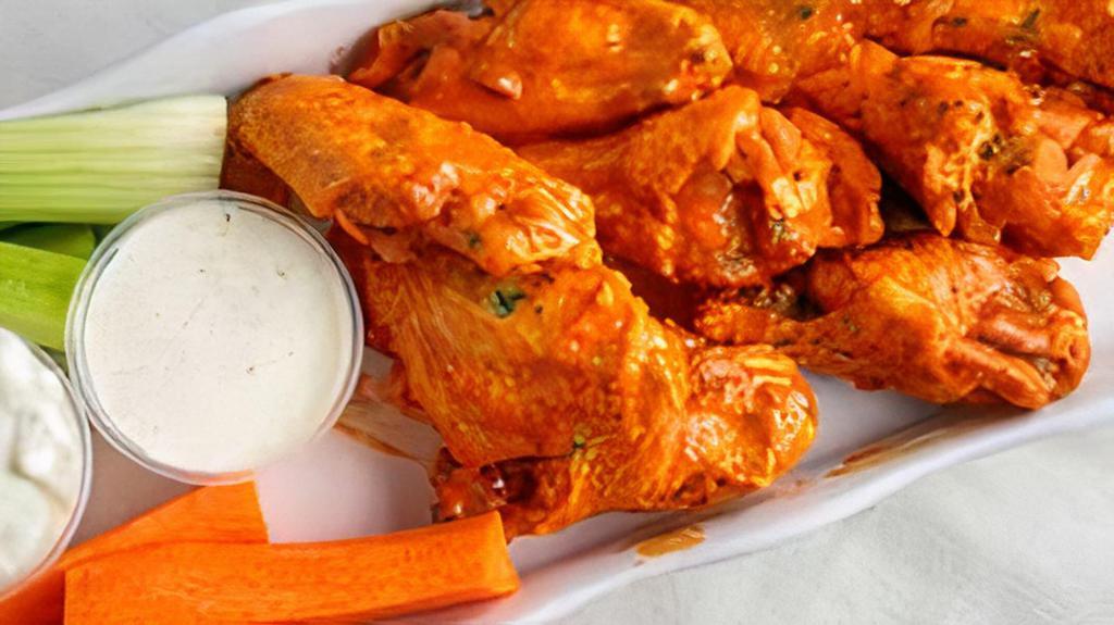 50 Wings · Served with celery, carrots, ranch, or Bleu cheese dressing.