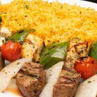 Combo Kabob Plate · Two skewers of our juicy steak and chicken kabobs. Skewers are flame-grilled with tomatoes, ...