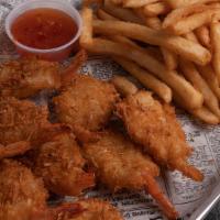Coconut Shrimp · Coconut Shrimp served with side of sweet chili sauce and a side of your choice.