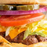 Fire  Burger · Our signature patty with American cheese, lettuce, tomato, onions, pickles, and mayo. 1/2 lb...
