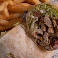 Chipotle Chicken Wrap · Marinated chicken breast, lettuce, tomatoes, mixed Cheddar and Jack cheese, bacon, and toppe...