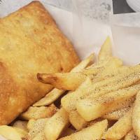 Beef Pizza Puff W Fries · Beef Pizza Puff with fries.  Make a combo for $2 more that includes 2 Pizza Puffs,  fries, a...