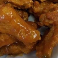 6 Wingettes & Fries · 6 chicken wingettes tossed in buffalo or bbq  sauce