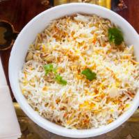 India Palace Special Pillau Rice · Saffron flavored basmati rice sauted with peas, fruits, nuts and homemade cheese.