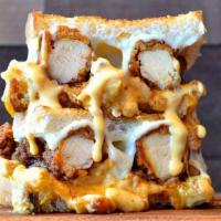 Fan Favorite! Nashville Hot Chicken Grilled Cheese · Crispy Nashville hot chicken tenders, and mac and cheese (made with bacon and green chiles) ...