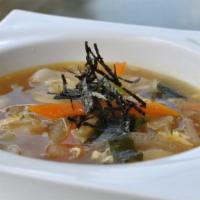 Dumpling Soup · Meat and vegetable dumplings in beef broth.