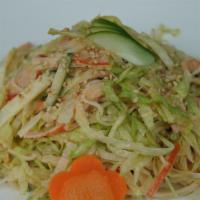 Spicy Crab Salad · Lettuce, tomatoes, cucumbers, onions with spicy crab & tempura flakes.