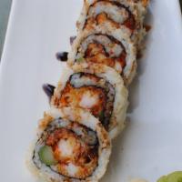 Resource Roll · shrimp tempura, crab, asparagus, spicy mayo, tobiko, tempura flakes & eel sauce.