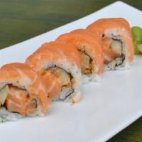 Sakura Roll · spicy salmon roll w/ cucumber & salmon on top.