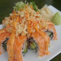 Sunshine Roll · California roll topped w/ salmon, baked crab & scallops - finished w/ coating of spicy mayo,...